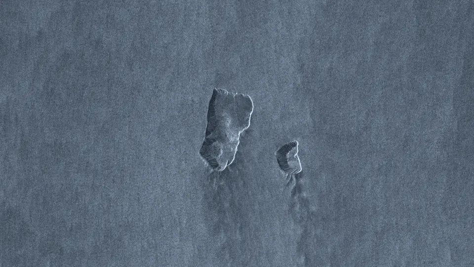 Satellite radar image of the Diomede Islands in the Bering Strait on 16 November 2024, surrounded by open water.