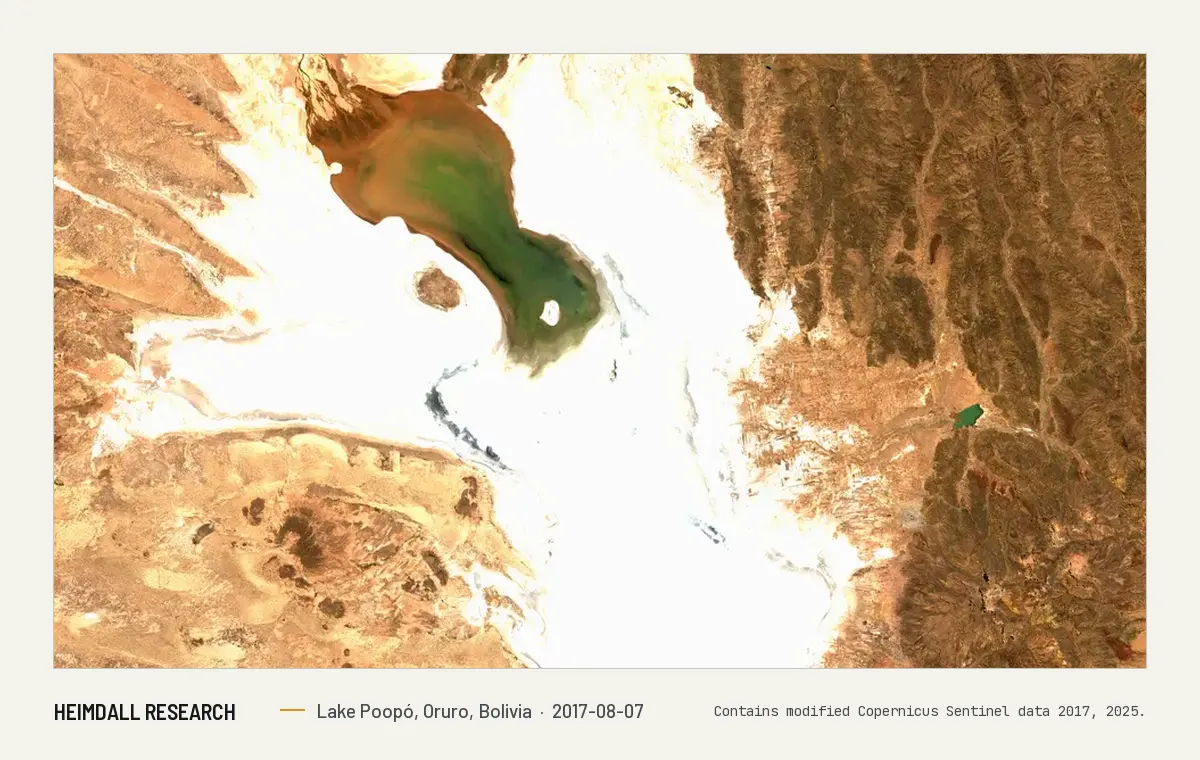 Print preview: Satellite image from August 2017 of the Lake Poopó basin: a bright white salt flat filling most of the frame, with a green and brown pool of water in the northern basin and brown mountains either side.